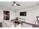 The spacious living room boasts hardwood floors, recessed lighting, and an open floor plan at 2233 Peachtree Ne Rd # 903, Atlanta, GA 30309