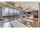 Elegant lounge area with herringbone floors, comfortable seating, and floor-to-ceiling windows at 2233 Peachtree Ne Rd # 903, Atlanta, GA 30309