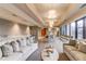 Inviting lounge area with comfortable couches, herringbone floors, and bright lighting for relaxation at 2233 Peachtree Ne Rd # 903, Atlanta, GA 30309