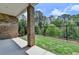 Patio area leading to a fenced backyard with green grass at 240 Walker Avenue, Roswell, GA 30076