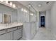 Bright bathroom featuring large glass shower, double sink vanity, and modern fixtures at 240 Walker Avenue, Roswell, GA 30076