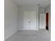 Bedroom boasts neutral carpet, walls, and a closet with double doors at 240 Walker Avenue, Roswell, GA 30076