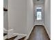 Inviting entryway with hardwood floors and white trim detail at 240 Walker Avenue, Roswell, GA 30076
