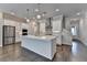 Bright kitchen with stainless appliances, a large island, and hardwood floors, perfect for entertaining guests at 240 Walker Avenue, Roswell, GA 30076