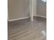 The basement features a neutral color palette and attractive, modern flooring at 9278 Seminole Rd, Jonesboro, GA 30236