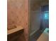 Bathroom featuring floral wallpaper, tile floors, and a single sink vanity at 9278 Seminole Rd, Jonesboro, GA 30236