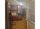 Kitchen with tile floor and oak cabinets, complemented by stainless appliances at 9278 Seminole Rd, Jonesboro, GA 30236