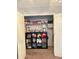 Walk-in closet featuring wire rack shelving and a black cubed bookshelf at 1425 Watercrest Cir, Lawrenceville, GA 30043