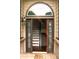 Welcoming entryway showcases hardwood floors and stairs leading to the upper level at 1425 Watercrest Cir, Lawrenceville, GA 30043