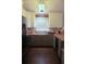 A kitchen featuring butcher block countertops and painted gray bottom cabinets at 1425 Watercrest Cir, Lawrenceville, GA 30043