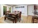 Dining area featuring hardwood floors and built-in cabinets at 220 N Springs Ct, Sandy Springs, GA 30328