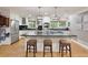 Bright kitchen with stainless steel appliances, large island, and modern finishes at 220 N Springs Ct, Sandy Springs, GA 30328