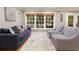 Cozy living room with a stylish sofa and armchairs at 220 N Springs Ct, Sandy Springs, GA 30328
