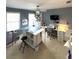 Bright craft room with ample workspace, sewing machines, storage, and natural light, ideal for creative projects at 2532 Greenes Ln, Powder Springs, GA 30127