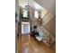 Inviting foyer with hardwood floors, staircase, high ceilings, and decorative accents at 2532 Greenes Ln, Powder Springs, GA 30127