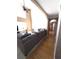 Cozy living room with hardwood floors, ample seating, and natural light, perfect for relaxation at 2532 Greenes Ln, Powder Springs, GA 30127