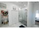 Bright bathroom featuring a glass enclosed shower, modern fixtures, and artistic decor providing a spa like feel at 3273 Elm St, Atlanta, GA 30337