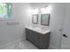 Bright bathroom features a double sink vanity and large mirrors at 3273 Elm St, Atlanta, GA 30337