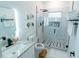 Stylish bathroom featuring granite countertop, and glass-enclosed shower at 3273 Elm St, Atlanta, GA 30337