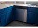 Modern kitchen features stylish blue cabinets and stainless steel appliances at 3273 Elm St, Atlanta, GA 30337