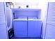 Compact laundry room equipped with a modern washer and dryer unit for convenience at 3273 Elm St, Atlanta, GA 30337