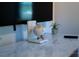 Close up of decor elements and a mounted flat screen TV at 3273 Elm St, Atlanta, GA 30337