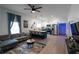 Open-concept living area with modern kitchen, cozy seating, and stylish decor at 3273 Elm St, Atlanta, GA 30337