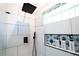 Close up of stylish shower showcasing modern fixtures and unique tile accents at 3273 Elm St, Atlanta, GA 30337