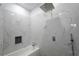 Spa shower featuring marble tile and rainfall showerhead at 3273 Elm St, Atlanta, GA 30337
