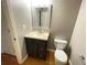 Bathroom featuring modern fixtures, stylish vanity and toilet at 790 Village Field Ct, Suwanee, GA 30024