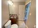 Cozy bathroom featuring a vanity with a sink, tile flooring, and a bright, neutral color scheme at 790 Village Field Ct, Suwanee, GA 30024
