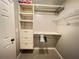 Closet with custom organizers, drawers, shelving, and hanging racks for optimal storage at 790 Village Field Ct, Suwanee, GA 30024