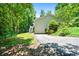 Back of the home with garage and staircase at 1294 Red Rock Rd, Acworth, GA 30101