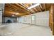Unfinished basement with concrete flooring and exposed ceiling at 1294 Red Rock Rd, Acworth, GA 30101