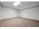 A partially finished basement is carpeted with white walls and a drop ceiling at 1294 Red Rock Rd, Acworth, GA 30101