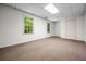 Partially finished basement space with carpeting and recessed lighting at 1294 Red Rock Rd, Acworth, GA 30101