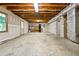 Unfinished basement with concrete flooring and exposed duct work at 1294 Red Rock Rd, Acworth, GA 30101