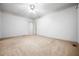Spacious carpeted bedroom with a ceiling fan and white walls for a clean, modern look at 1294 Red Rock Rd, Acworth, GA 30101