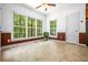 Bright breakfast nook with large windows offering views of the backyard at 1294 Red Rock Rd, Acworth, GA 30101