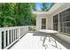 View of bright wooden deck with outdoor furniture, perfect for relaxing and entertaining at 1294 Red Rock Rd, Acworth, GA 30101