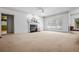 Spacious living room features a fireplace, carpet, and large windows for plenty of natural light at 1294 Red Rock Rd, Acworth, GA 30101