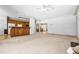 Spacious open-concept living room with a bar area connecting to the kitchen and dining area at 1294 Red Rock Rd, Acworth, GA 30101