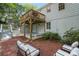 Backyard featuring a brick patio and an elevated deck, perfect for enjoying outdoor living at 2316 Hurst Ne Dr, Atlanta, GA 30305