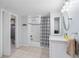 Bathroom featuring shower-tub combination with a sleek single sink vanity and tile flooring at 2316 Hurst Ne Dr, Atlanta, GA 30305