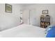 Bright bedroom featuring a view to another room, a closet, and a bookcase at 2316 Hurst Ne Dr, Atlanta, GA 30305