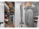 Closet with built-in shelving and a hanging rack, plus storage visible at 2316 Hurst Ne Dr, Atlanta, GA 30305