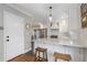 Bright kitchen featuring white cabinetry, stainless steel appliances, and hardwood flooring at 2316 Hurst Ne Dr, Atlanta, GA 30305