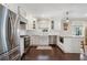 Bright kitchen featuring white cabinetry, stainless steel appliances, and farmhouse sink at 2316 Hurst Ne Dr, Atlanta, GA 30305