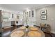 Open kitchen with stainless steel appliances and a breakfast table with seating at 2316 Hurst Ne Dr, Atlanta, GA 30305
