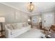 Bright living room with a large window, modern furniture, and stylish lighting at 2316 Hurst Ne Dr, Atlanta, GA 30305